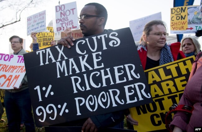 واشنگٹن ڈی سی میں ٹیکس اصلاحات کے خلاف مظاہرہ۔ فائل فوٹو