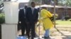 Zimbabwe's new health minister, Obadiah Moyo, arrives at Beatrice Infectious Diseases Hospital, where cholera patients are being treated, in Harare, Sept. 11, 2018. (C. Mavhunga/VOA)