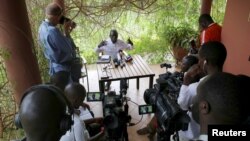 FILE - Journalists attend a news conference following disputed presidential elections, in the outskirts of Kampala, Uganda, Feb. 21, 2016. The country announced new rules for foreign journalists on December 10, 2020, ahead of the January 4 elections.