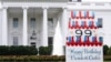 FILE - A sign wishing a happy birthday to former US President Jimmy Carter sits on the North Lawn of the White House in Washington Sept. 30, 2023, ahead of his 99th birthday on Oct. 1.