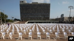 One thousand chairs symbolizing people who died from the coronavirus are placed at the Rabin Square in Tel Aviv, Israel, Sept. 7, 2020. 