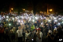 Demonstrators chant slogans during a Black Lives Matter protest at the Mark O. Hatfield United States Courthouse, July 29, 2020, in Portland, Oregon.