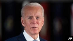 Democratic presidential candidate former Vice President Joe Biden speaks to members of the press at the National Constitution Center in Philadelphia, March 10, 2020. 