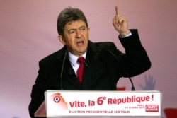 FILE - Jean-Luc Melenchon speaks to supporters at Place Stalingrad in Paris, April 22, 2012.