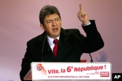 FILE - Jean-Luc Melenchon speaks to supporters at Place Stalingrad in Paris, April 22, 2012.