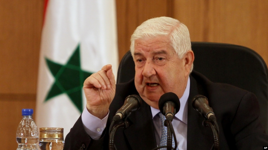 Menteri Luar Negeri Suriah Walid al-Moallem dalam sebuah konferensi pers di Damaskus. (Foto: Dok)