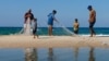 FILE - Palestinian fishermen work, amid the ongoing conflict between Israel and Palestinian Islamist group Hamas, in Khan Younis, in the southern Gaza Strip, Oct. 31, 2024. 