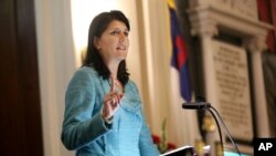 South Carolina Gov. Nikki Haley addresses a full church during a prayer vigil held at Morris Brown AME Church for the victims of the shooting at Emanuel AME Church in Charleston, June 18, 2015. 