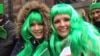 These two girls were cold but happy at New York&#39;s Saint Patrick&#39;s Day Parade, March 17, 2014. (VOA Photo by Adam Phillips)