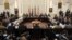 Delegations from Afghanistan, Pakistan, the United States of America and China discuss a road map for ending the war with the Taliban at the Presidential Palace in Kabul, Afghanistan, Jan. 18, 2016. 