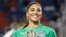 United States' goalkeeper Hope Solo (1) poses with the golden glove award after the SheBelieves Cup, March 9, 2016, in Boca Raton, Florida. 