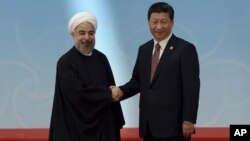 Les leaders iranien et chinois, samedi 23 janvier 2016.