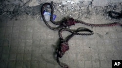 A bloodstained rope lies on the floor in the infamous Saydnaya military prison, just north of Damascus, Syria, Dec. 9, 2024. 