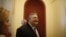 Socialist leader Evangelos Venizelos, walks inside the Parliament building after meeting with Greece's conservative election victor Antonis Samaras in Athens Monday, June 18 2012. 