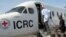 FILE - Freed South Sudanese prisoners board a Red Cross plane, Feb. 11, 2013. The South Sudan government and rebels loyal to former Vice President Riek Machar said Jan. 9, 2018, they are not holding political detainees or prisoners of war.
