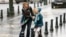 A woman and her daughter struggle against strong winds and rain in central Brussels, Belgium. According to local media, the winds could reach speeds of over 100 km per hour (62 miles per hour).