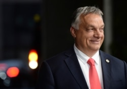 Hungary's Prime Minister Viktor Orban leaves the EU Council building during an EU summit in Brussels, July 20, 2020.