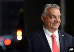 Hungary's Prime Minister Viktor Orban leaves the EU Council building during an EU summit in Brussels, July 20, 2020.