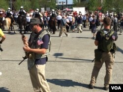 Protester is seen outside the convention hall in Cleveland, Ohio on July 19, 2016. (VOA/Mia Bush)