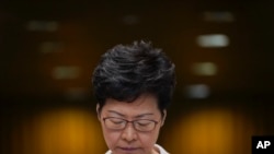 Hong Kong Chief Executive Carrie Lam reacts during a press conference in Hong Kong, Nov. 26, 2019. 