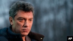 FILE - Boris Nemtsov speaks to The Associated Press Television News in Moscow, Russia, Dec. 21, 2011.