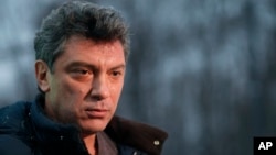 FILE - Boris Nemtsov speaks to The Associated Press Television News in Moscow, Russia, Dec. 21, 2011.