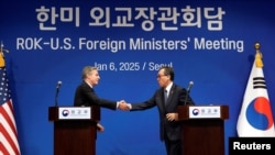 U.S. Secretary of State Antony Blinken and South Korean Foreign Minister Cho Tae-yul shake hands in Seoul, South Korea, Monday, Jan. 6, 2025.