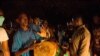 FILE - Supporters of Malian politician Soumaila Cisse celebrate in front of his house in Bamako, Mali, on Oct. 8, 2020, after hearing the news that he landed at the Bamako airport after having been freed from captivity.