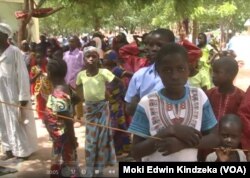 Some of the many former Boko Haram hostages who want to return home, in Mozogo, Cameroon, Oct. 21, 2017. Local communities are refusing to allow the hostages to return, fearing being infiltrated again by terrorists.