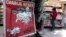 FILE - The front page of satirical French weekly Charlie Hebdo entitled "C'est Reparti" ("Here we go again"), is displayed at a kiosk in Nice, France. 