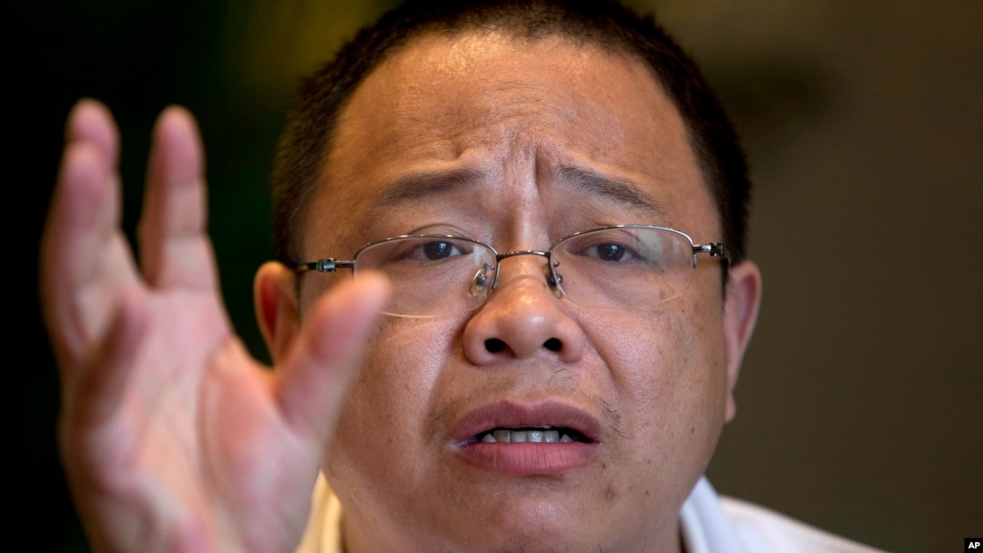 原湖南宁远县工业园区管委会副主任肖疑飞在北京接受采访。(2014年5月5日资料照)