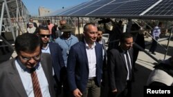 Nickolay Mladenov, the U.N. special coordinator for Middle East peace, visits a solar energy project at Nasser hospital in the southern Gaza Strip, May 13, 2019.
