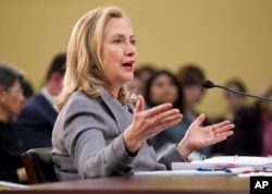 FILE - Then-Secretary of State Hillary Clinton discusses North Korean nuclear activities in an appearance before a U.S. House subcommittee on Capitol Hill in Washington, Feb. 29, 2012.