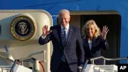 U.S. President Joe Biden and First Lady Jill Biden arrive at RAF Mildenhall, England, ahead of the G7 summit in Cornwall, June 9, 2021. 