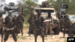 A screengrab taken on July 13, 2014 from a video released by the Nigerian Islamist extremist group Boko Haram and obtained by AFP shows the leader of the Nigerian Islamist extremist group Boko Haram, Abubakar Shekau.