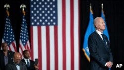 President Joe Biden listened as he is introduced to speak to commemorate the 100th anniversary of the Tulsa race massacre, at the Greenwood Cultural Center, June 1, 2021, in Tulsa, Okla.