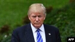 Republican presidential nominee Donald Trump visits the Gerald Ford Presidential Museum in Grand Rapids, Michigan, Sept. 30, 2016. /