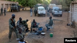 Soldiers rest at the Malian military base in Diabaly, which just 10 weeks ago was under control of Islamist rebels, 400 km from Bamako, March 15, 2013.