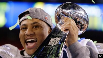 Russell Wilson With Lombardi Trophy Super Bowl 48 Seattle