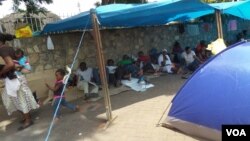 Some of the women and children camping at the GMB headquarters in Harare. (Photo: Patricia Mudadigwa)