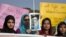 Žene iz pakistanske verske grupe "Minhadž-ul-Kuran" drže sliku Malale Josufzai tokom demonstracija u Islamabadu