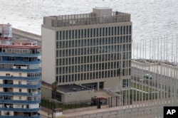 FILE - The United States Interests Section diplomatic mission is seen in Havana, Cuba.