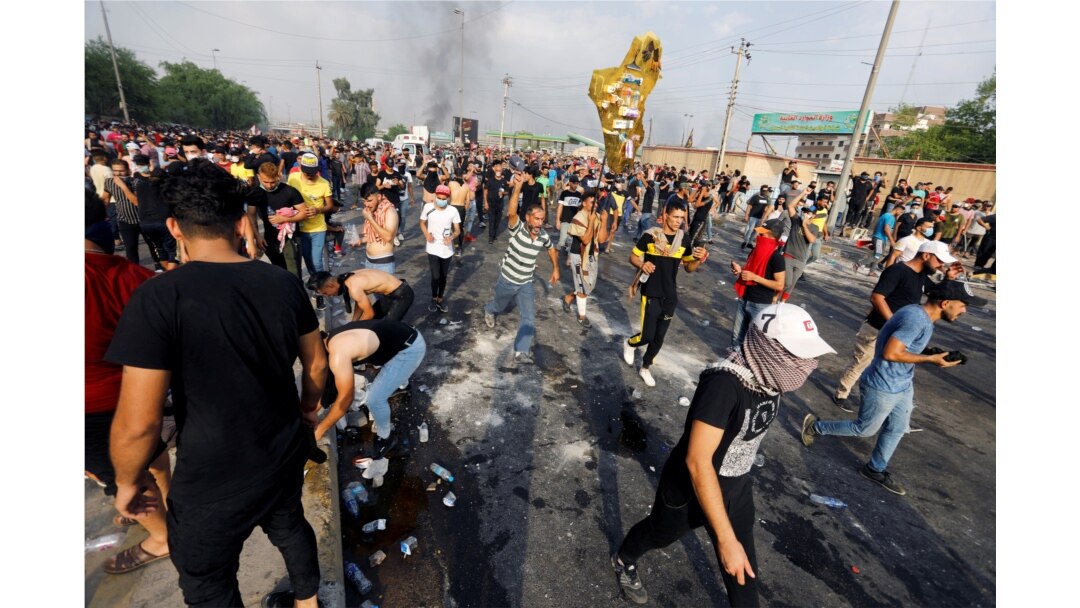 Demonstrators take part in a protest over unemployment, corruption and poor public services, in Baghdad, Iraq, Oct. 2, 2019.