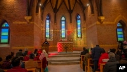 Devotees participate in Christmas prayers at the newl- renovated St. Luke's Church on Christmas in Srinagar, Indian-controlled Kashmir, Dec. 25, 2021.