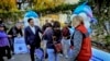 Los Angeles Unified Superintendent Alberto M. Carvalho greets students from Palisades Charter Elementary School upon their arrival at the Brentwood Elementary Science Magnet school in the Brentwood section of Los Angeles, Jan. 15, 2025.