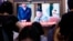 People watch a TV showing a file image of North Korean leader Kim Jong Un during a news program at the Seoul Railway Station in Seoul, South Korea, Wednesday, July 31, 2019. 