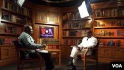 FILE: Ghana's finance minister, Ken Ofori-Atta, at right, speaks with VOA's Peter Clottey. Taken April 4, 2017.