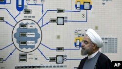 FILE - Iran's President Hassan Rouhani visits the Bushehr nuclear power plant, Jan. 13, 2015. 