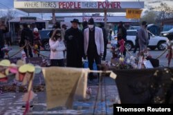 Reverend Jesse Jackson visits site of where George Floyd was killed in Minneapolis, April 20, 2021.