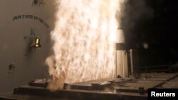 A Standard Missile-3 Block 1A interceptor is launched from the guided-missile cruiser USS Lake Erie during a Missile Defense Agency and U.S. Navy test in the Pacific Ocean, Feb. 13, 2013.
